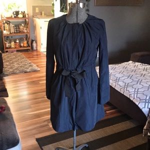 Navy blue pea coat/rain jacket.